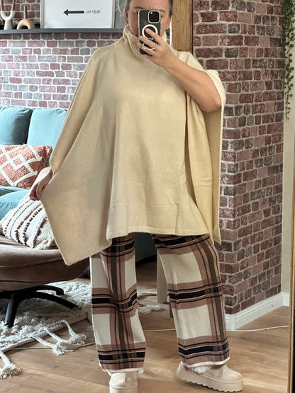 PONCHO MIT ROLLKRAGEN