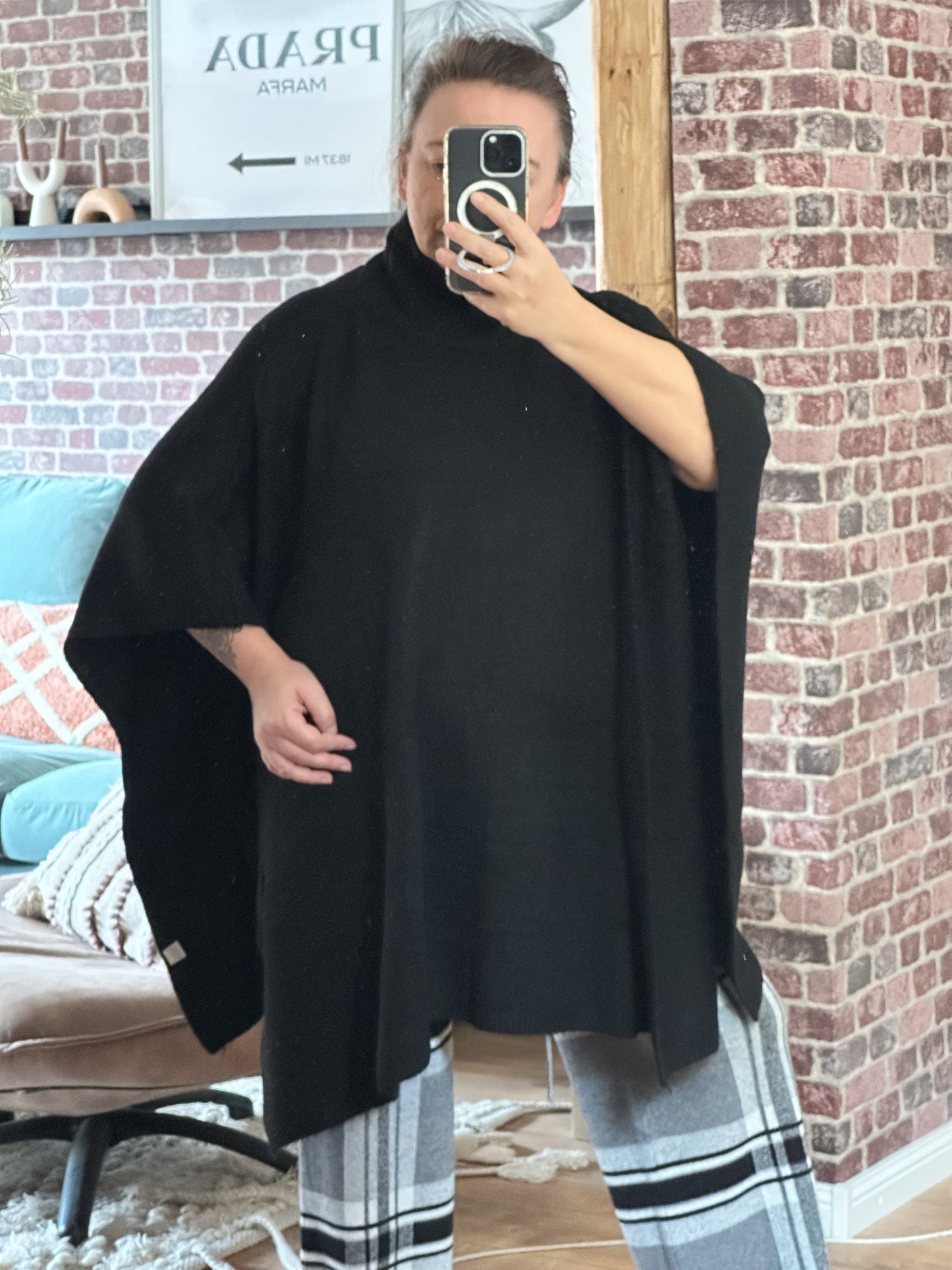 PONCHO MIT ROLLKRAGEN